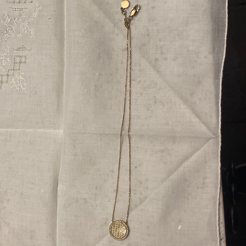 Gold Michael Kors Necklace. Iridescent with clear gems